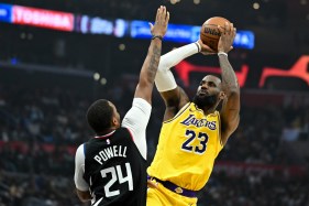 James scores 19 of his 34 points and hits five of his seven 3-pointers during a brilliant fourth quarter as the Lakers rally for a dramatic 116-112 victory.