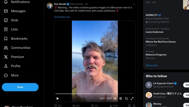 Wisconsin US Senate candidate Eric Hovde plunges her shirtless body into a frozen Lake Mendota, as seen in a video he posted to Twitter/X on Thursday, Feb. 29, 2024. The GOP candidate challenged  his opponent, Democratic Sen. Tammy Baldwin, to do the same. (Image from Twitter/X)
