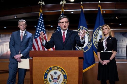 Speaker of the House Mike Johnson, R-La., center, flanked by Rep. Blake Moore, R-Utah, left, and Rep. Beth Van Duyne, R-Texas, discusses President Joe Biden for his policies at the Mexican border during a news conference at the Capitol in Washington, Thursday, Feb. 29, 2024. (AP Photo/J. Scott Applewhite)
