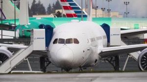 A new Boeing 787 Dreamliner is seen between the main runway and the Boeing Delivery Center at Paine Field in Everett, Washington on Tuesday Dec. 15, 2020. Paine Field is across the street from the Boeing Factory where the 787 is assembled. The green colored planes in the background are 777's.