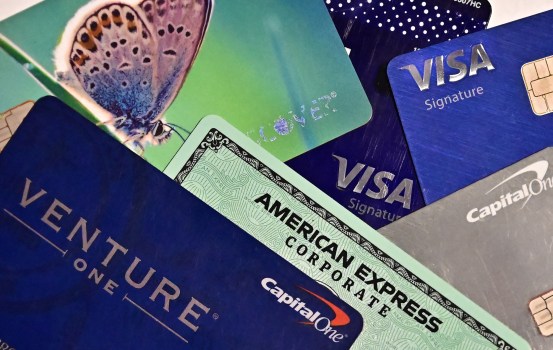An illustration photo shows a display of credit cards